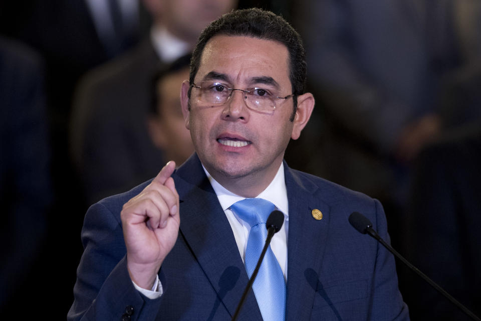 Guatemala's President Jimmy Morales gives a statement, at the National Palace in Guatemala City, Monday, Jan. 7, 2019. Guatemala announced that it is going to withdraw from UN-sponsored anti-corruption commission. (AP Photo/Moises Castillo)