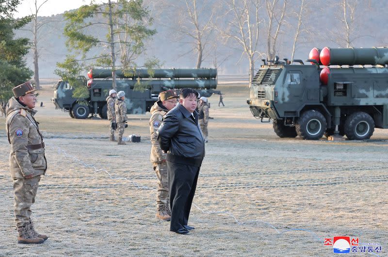 North Korean leader Kim Jong Un guides a training of the fire division