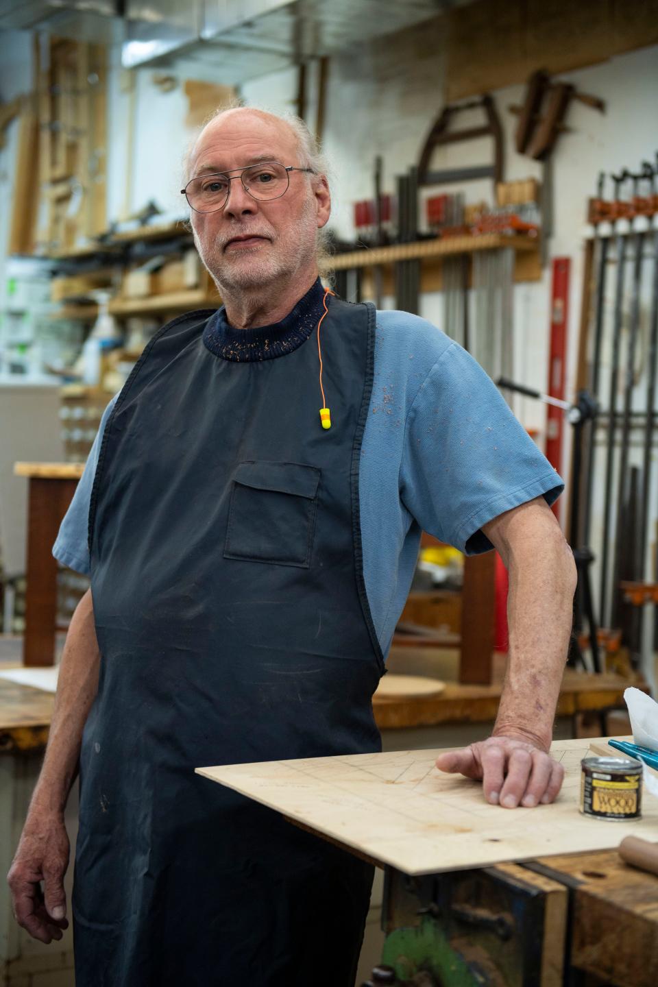 Michael McDunn, Open Studios participant, stands for a portrait in his studio in Greenville on Wednesday, Oct. 26, 2022. 