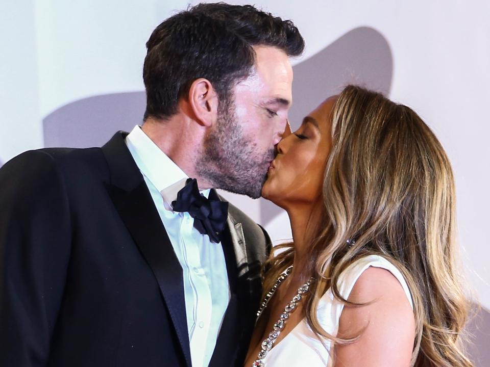 Ben Affleck and Jennifer Lopez kissing at the 2021 Venice Film Festival.