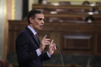 Spain's Prime Minister Pedro Sanchez delivers a speech in a parliamentary session in Madrid, Spain, Wednesday Oct. 21, 2020. Spanish Prime Minister Pedro Sanchez faces a no confidence vote in Parliament put forth by the far right opposition party VOX. (AP Photo/Manu Fernandez, Pool)