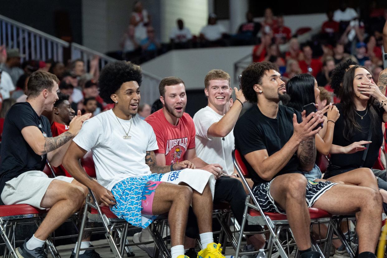 Current members of the University of Louisville men’s basketball team cheers on The Ville during their game on Saturday, July 20, 2024 in Louisville, Ky. at Freedom Hall during the first round of The Basketball Tournament.