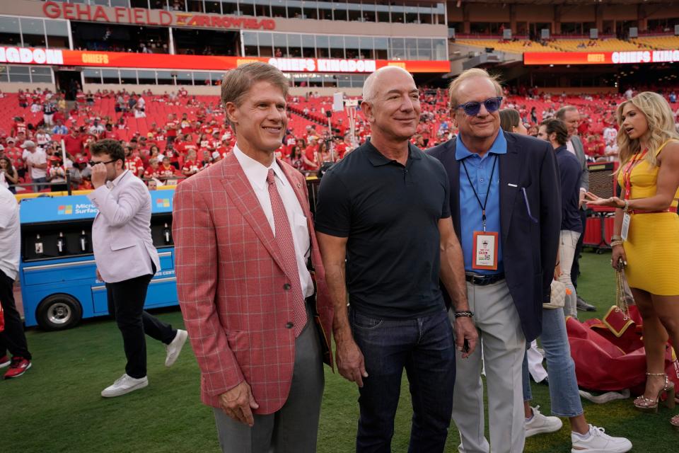 Week 2: Amazon founder Jeff Bezos poses with Kansas City Chiefs owner Clark Hunt (left) and Los Angeles Chargers owner Dean Spanos before the start of the Chargers-Chiefs game.