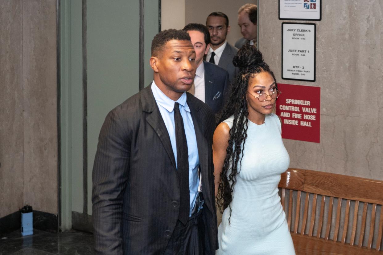 Jonathan Majors, accompanied by girlfriend Meagan Good, enters a courtroom at the Manhattan Criminal Courthouse in New York (Copyright 2023 The Associated Press. All rights reserved.)