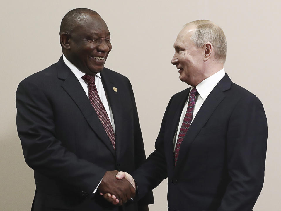 Russian President Vladimir Putin, right, and South Africa's President, Cyril Ramaphosa smile while posing for a photo prior to their talks on the sideline of Russia-Africa summit in the Black Sea resort of Sochi, Russia, Wednesday, Oct. 23, 2019. (Sergei Fadeyechev, TASS News Agency Pool Photo via AP)