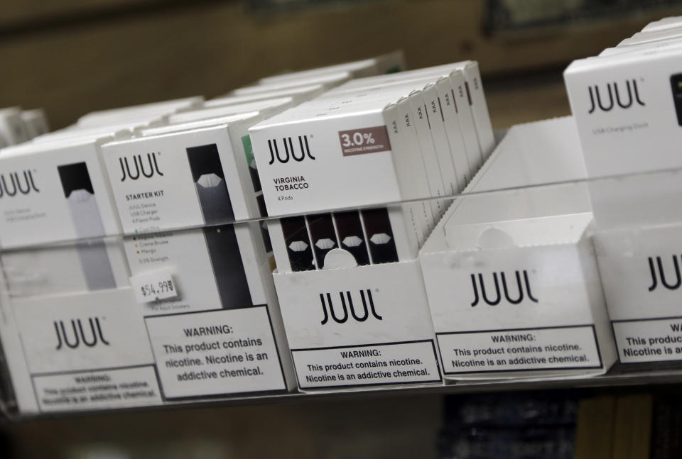 FILE - This Thursday, Dec. 20, 2018, file photo shows Juul products for sale. North Carolina’s attorney general has filed a lawsuit against the popular e-cigarette maker JUUL, asking a court to limit what flavors it can sell and ensure underage teens can’t buy it. (AP Photo/Seth Wenig, File)