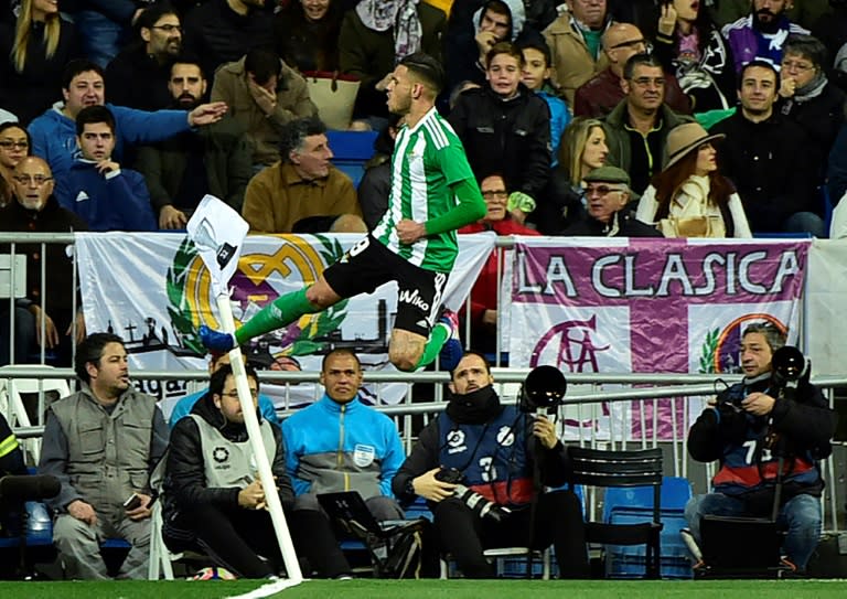 Betis' forward Antonio Sanabria celebrates a goal during the Spanish league footbal match Real Madrid CF vs Real Betis at the Santiago Bernabeu stadium in Madrid on March 12, 2017