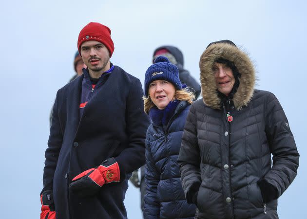 Spectators wrapped up in the cold and wet weather conditions in East Sussex, January 7, 2024.