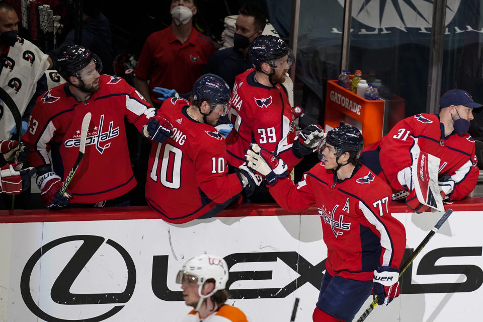 Washington Capitals right wing T.J. Oshie (77) celebrates his goal during the second period of an NHL hockey game against the Philadelphia Flyers, Friday, May 7, 2021, in Washington. (AP Photo/Alex Brandon)