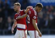 Britain Football Soccer - Swansea City v Middlesbrough - Premier League - Liberty Stadium - 2/4/17 Middlesbrough's Rudy Gestede and Ben Gibson look dejected after the match Action Images via Reuters / Andrew Boyers Livepic