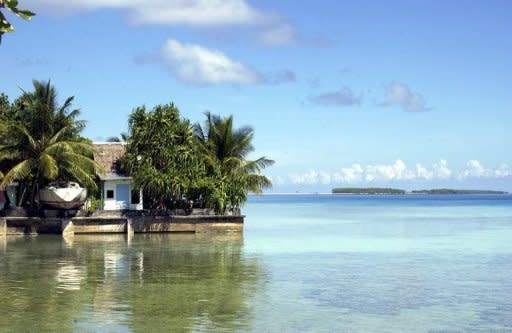 A concrete wall lining Atafu lagoon to hold back rising sea levels in the New Zealand dependency of Tokelau. Tiny Pacific nations which are most at threat from rising seas have vowed to dump diesel and other dirty expensive fuels blamed for causing global warming and replace them with clean sources