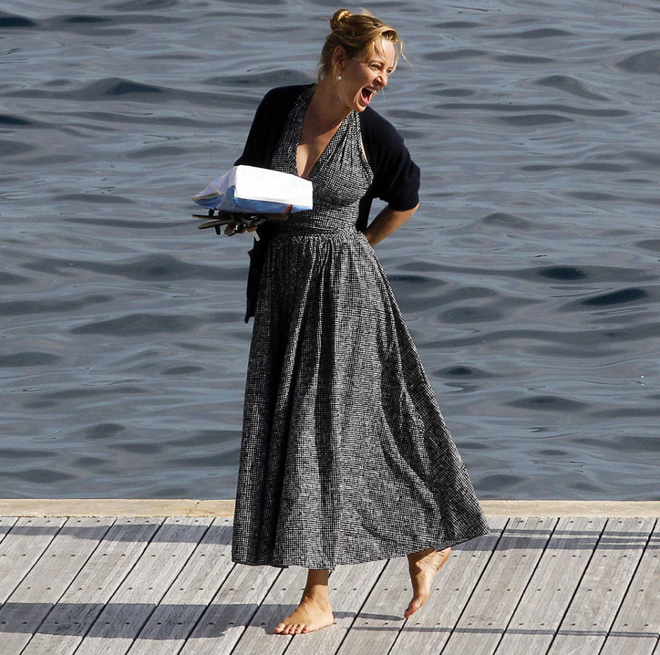 <p>The actress looked carefree as can be as she walked barefoot and laughing on the docks at Hotel du Cap-Eden-Roc. (Photo: Splash News) </p>