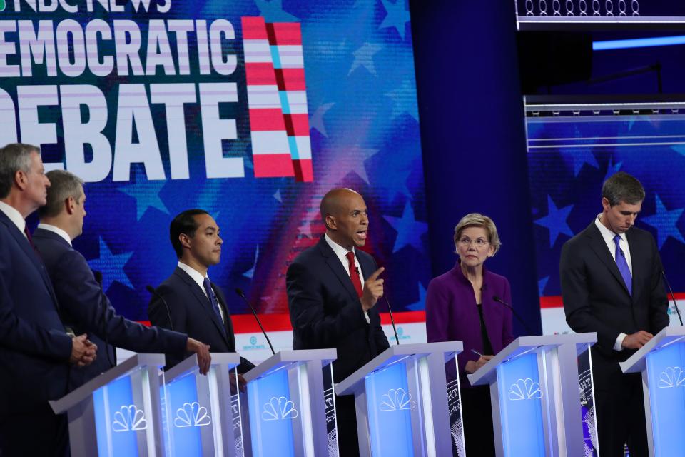 MIAMI, FLORIDA - JUNE 26:  (L-R) New York City Mayor Bill De Blasio, Rep. Tim Ryan (D-OH), former housing secretary Julian Castro, Sen. Cory Booker (D-NJ) Sen. Elizabeth Warren (D-MA) and former Texas congressman Beto O'Rourke take part in the first night of the Democratic presidential debate on June 26, 2019 in Miami, Florida.  A field of 20 Democratic presidential candidates was split into two groups of 10 for the first debate of the 2020 election, taking place over two nights at Knight Concert Hall of the Adrienne Arsht Center for the Performing Arts of Miami-Dade County, hosted by NBC News, MSNBC, and Telemundo. (Photo by Joe Raedle/Getty Images) ORG XMIT: 775360609 ORIG FILE ID: 1158529076