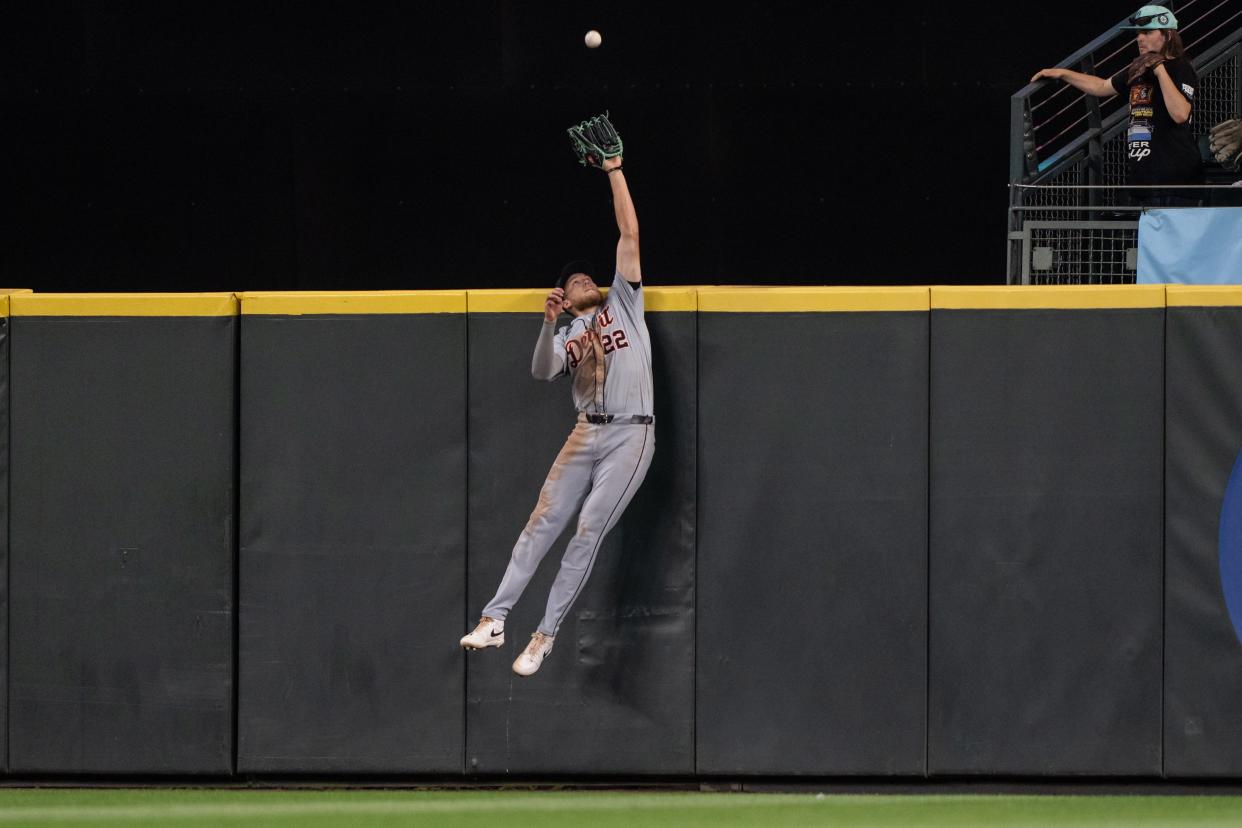 Center fielder Parker Meadows of the Detroit Tigers makes a leaping catch at the wall in the eighth inning against the Seattle Mariners at T-Mobile Park in Seattle on Wednesday, Aug. 7, 2024.