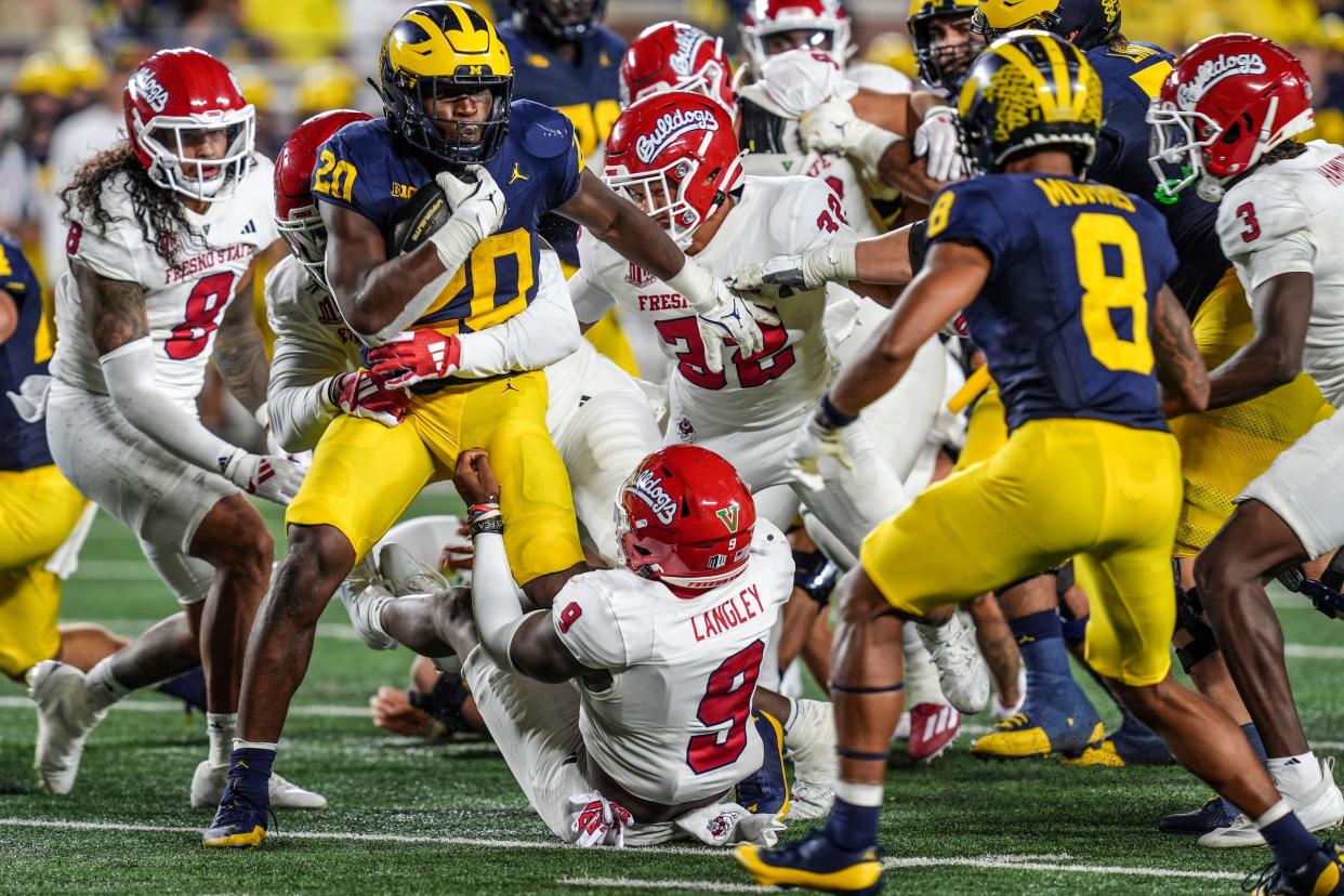 Michigan running back Kalel Mullings (20) runs during the 1st half against Fresno State at Michigan Stadium at Michigan Stadium in Ann Arbor on Saturday, Aug. 31, 2024.