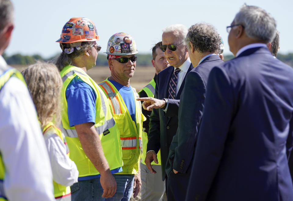 President Joe Biden speaks with workers at the groundbreaking of the new Intel semiconductor manufacturing facility in New Albany, Ohio, Friday, Sep. 9, 2022. (AP Photo/Manuel Balce Ceneta)