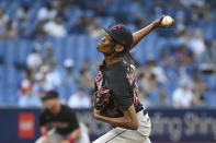 Cleveland Indians starting pitcher Triston McKenzie throws to a Toronto Blue Jays batter during the first inning of a baseball game Thursday, Aug. 5, 2021, in Toronto. (Jon Blacker/The Canadian Press via AP)