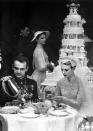 <p>Grace Kelly bid farewell to her Hollywood career and gained the title of Princess when she married Prince Rainier of Monaco. Here, they eat at their reception in 1956. </p>