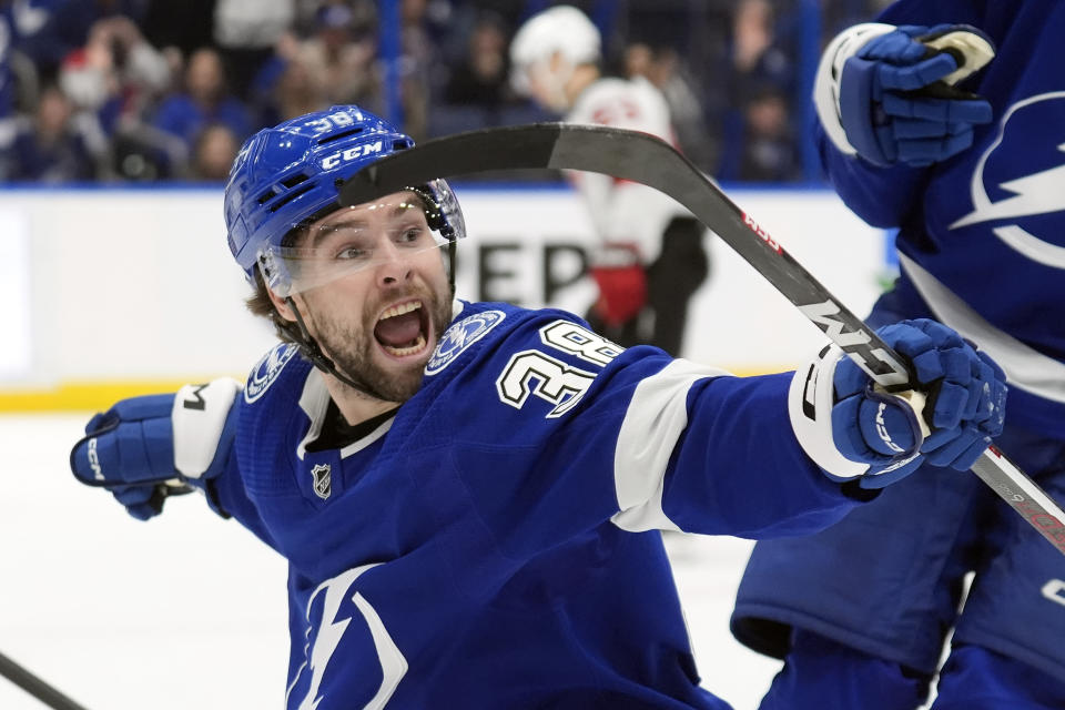 Tampa Bay Lightning left wing Brandon Hagel (38) celebrates his goal against the New Jersey Devils during the second period of an NHL hockey game Saturday, Jan. 27, 2024, in Tampa, Fla. (AP Photo/Chris O'Meara)