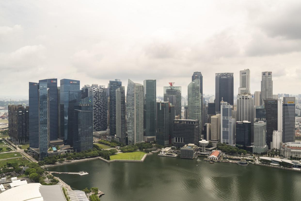 The Marina Bay Financial District and Central Business District in Singapore, on Monday, May 16, 2022. Singapore is scheduled to release its first-quarter gross domestic product (GDP) figures on May 19. Photographer: Ore Huiying/Bloomberg