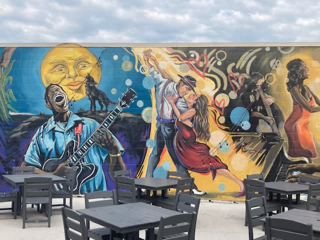 Part of the huge mural Dawn painted on the patio of the Palace Tavern, 701 15th Ave., East Moline, in 2022.