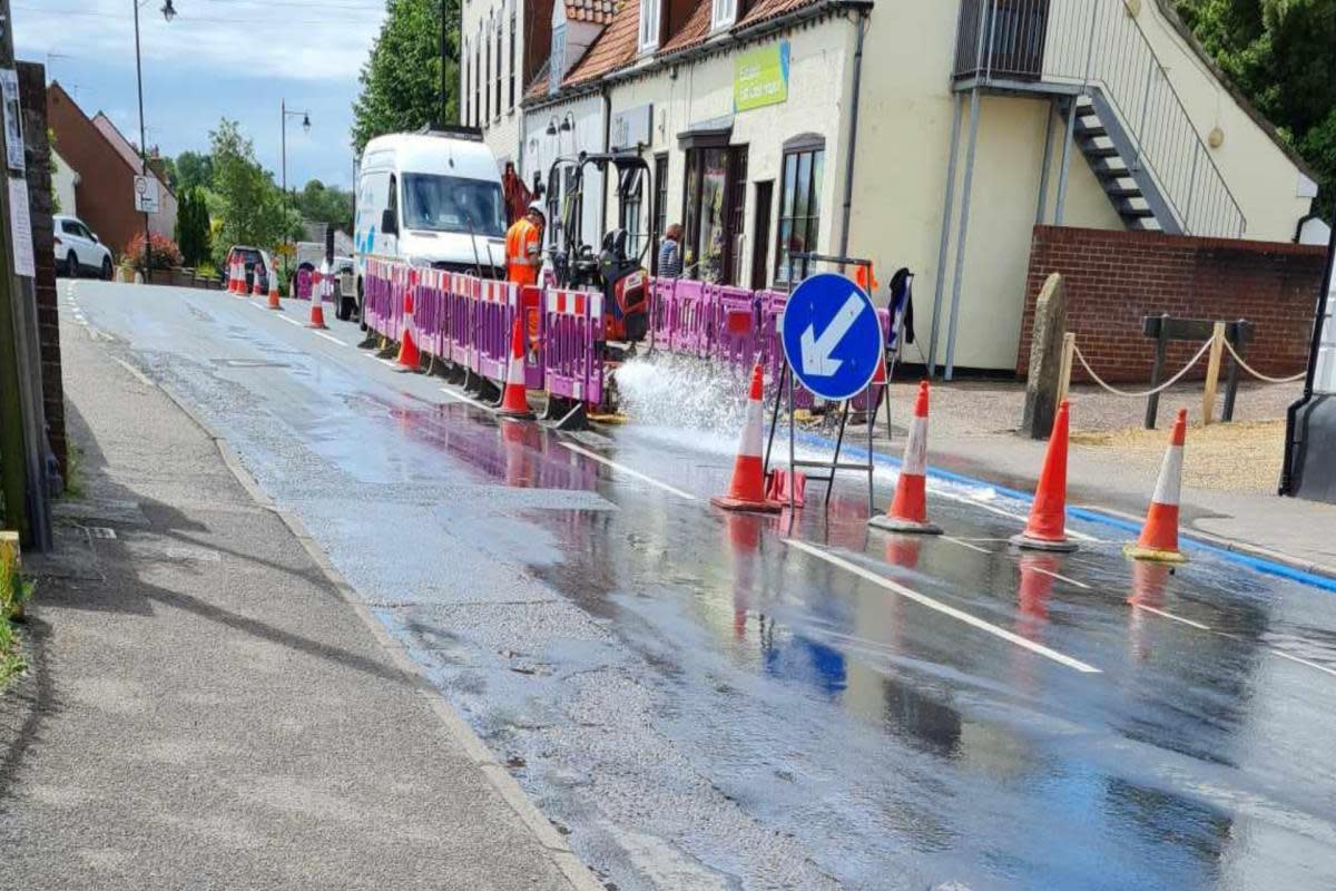 A photograph showing the burst water main on The Street in Acle <i>(Image: All About Acle)</i>