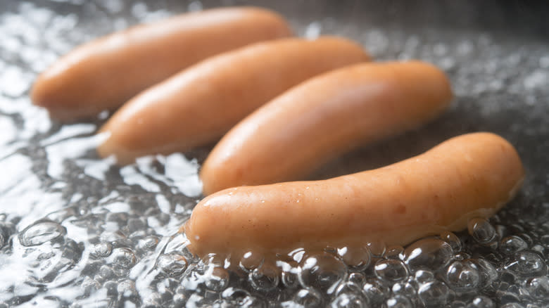 sausages in boiling water