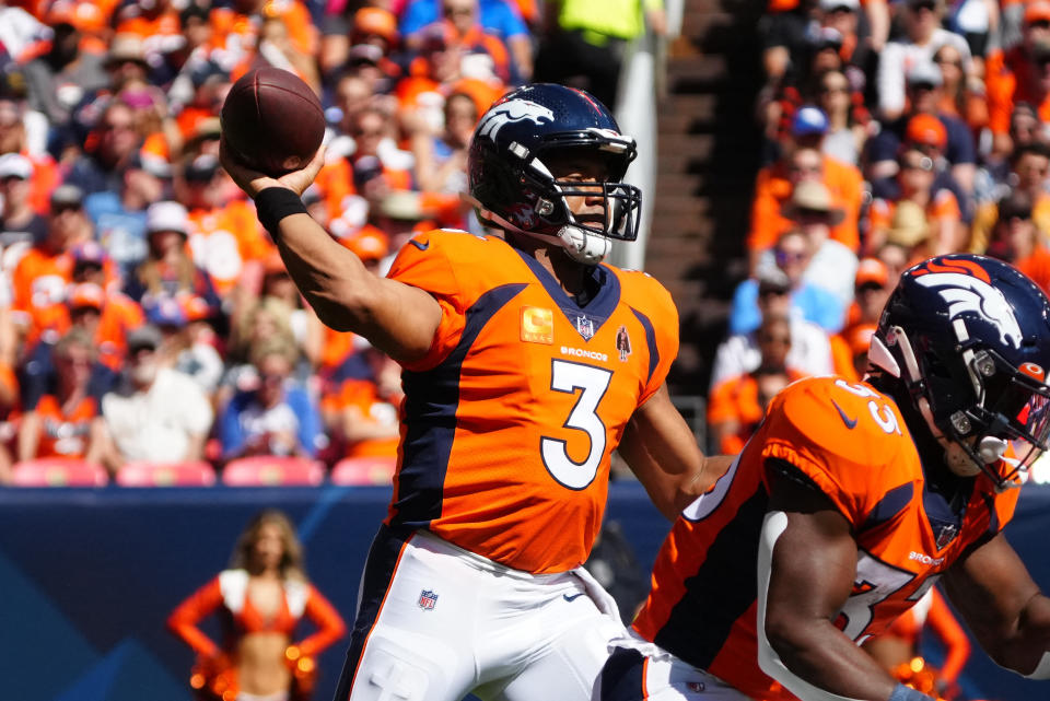 Sep 18, 2022; Denver, Colorado, USA; Denver Broncos quarterback Russell Wilson (3) passes the ball in the first quarter against the Houston Texans at Empower Field at Mile High. Mandatory Credit: Ron Chenoy-USA TODAY Sports NFL 
