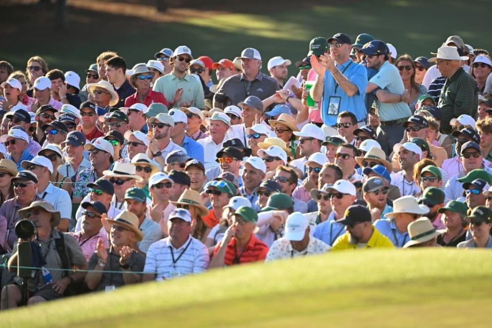 Spectators watch the action at the 18th green during Sunday's final round.