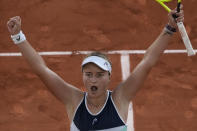 Czech Republic's Barbora Krejcikova celebrates as she defeats Maria Sakkari of Greece in their semifinal match of the French Open tennis tournament at the Roland Garros stadium Thursday, June 10, 2021 in Paris. (AP Photo/Christophe Ena)