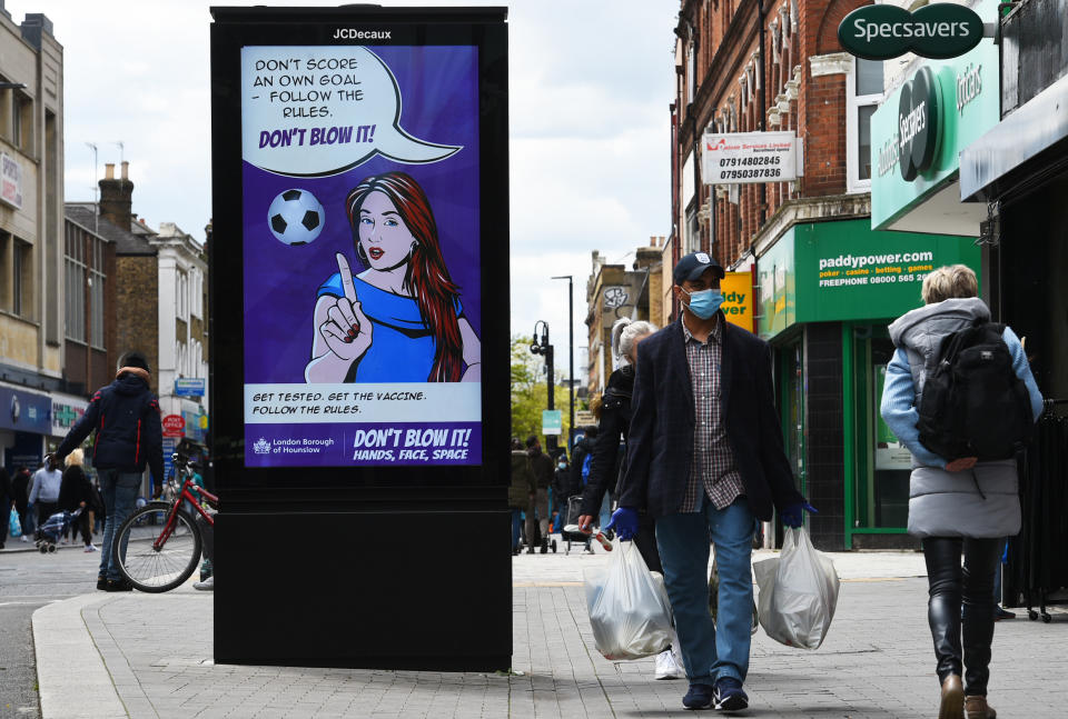 A Covid-19 sign on the high street in Hounslow, west London, one of the areas of the UK where the Covid variant first identified in India is spreading fastest. Picture date: Tuesday May 25, 2021. (Photo by Kirsty O'Connor/PA Images via Getty Images)