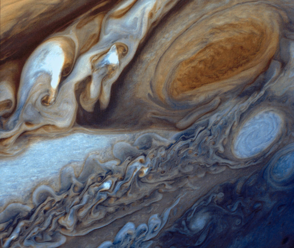 In January and February 1979, NASA's Voyager 1 spacecraft zoomed toward Jupiter, capturing hundreds of images during its approach, including this close-up of swirling clouds around <a href="http://www.nasa.gov/content/jupiters-great-red-spot-viewed-by-voyager-i/#.VI8byyfwNBK" target="_blank">Jupiter's Great Red Spot</a>. This image was assembled from three black and white negatives and newly released.