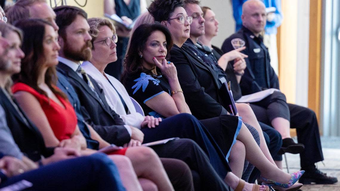 Odette Bolano, president and CEO of Saint Alphonsus, listens with her hand on her chin to Boise Mayor Lauren McLean deliver the State of the City address Thursday.