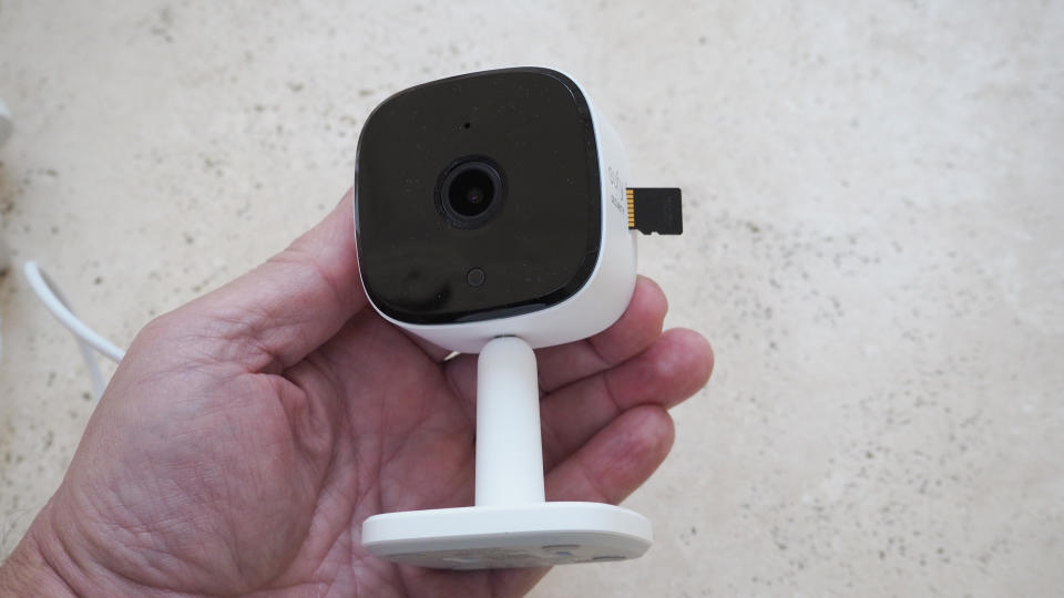 Eufy Indoor Cam C120 held in a hand