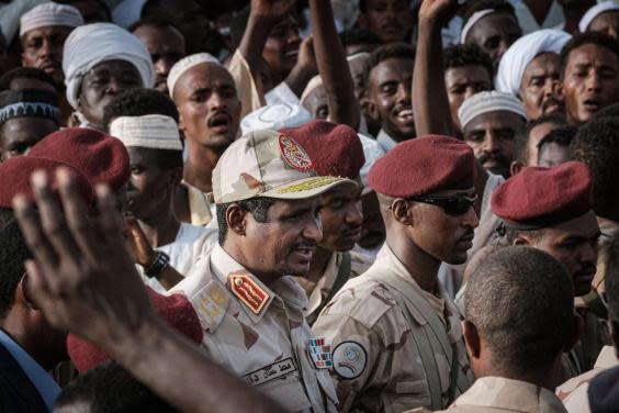 Hemedti arrives to give a speech during a rally in the village of Abraq (AFP/Getty)