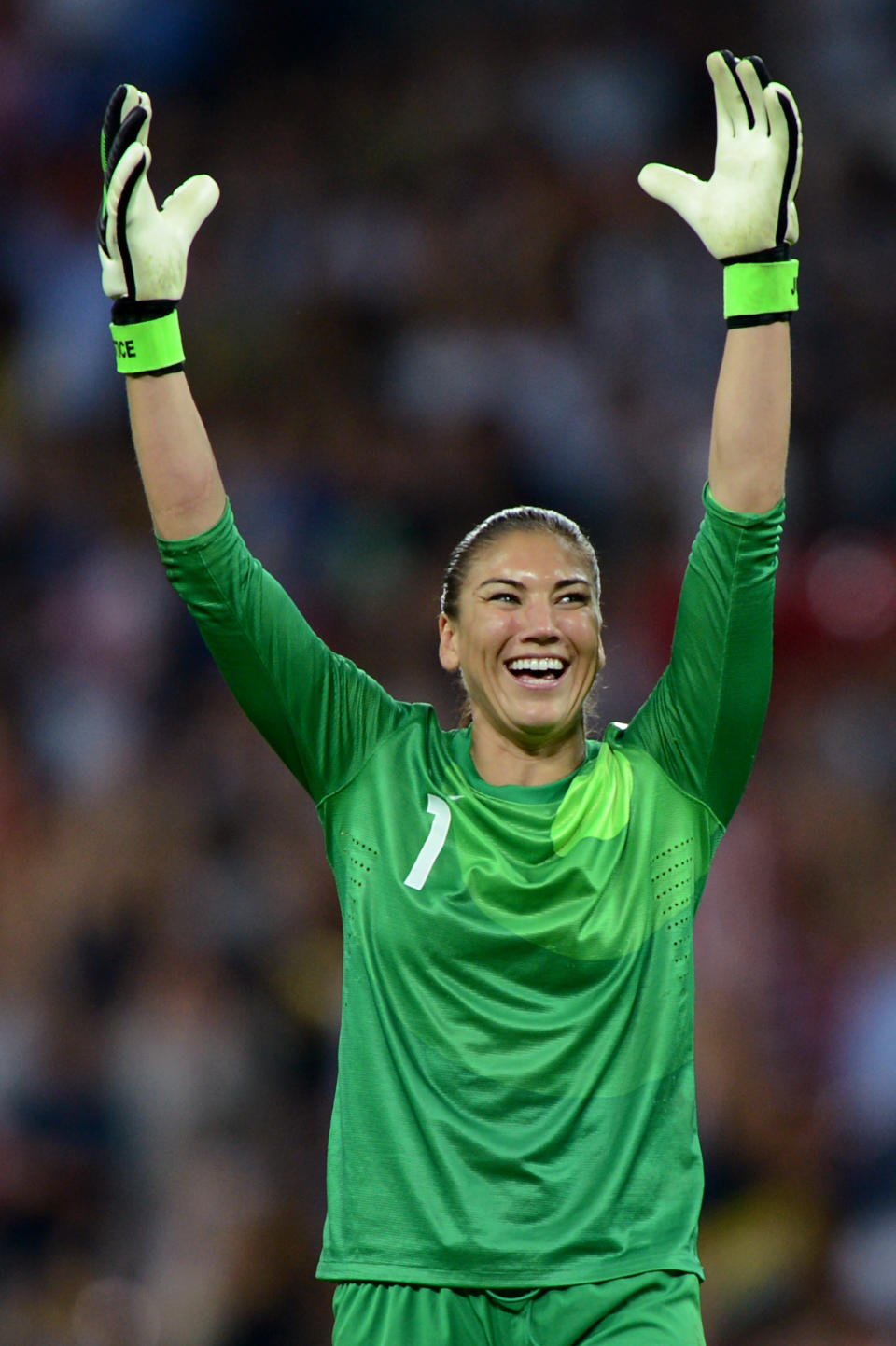 LONDON, ENGLAND - AUGUST 09: Hope Solo #1 of United States reacts after a goal by Carli Lloyd #10 in the second halfagainst Japan during the Women's Football gold medal match on Day 13 of the London 2012 Olympic Games at Wembley Stadium on August 9, 2012 in London, England. (Photo by Michael Regan/Getty Images)