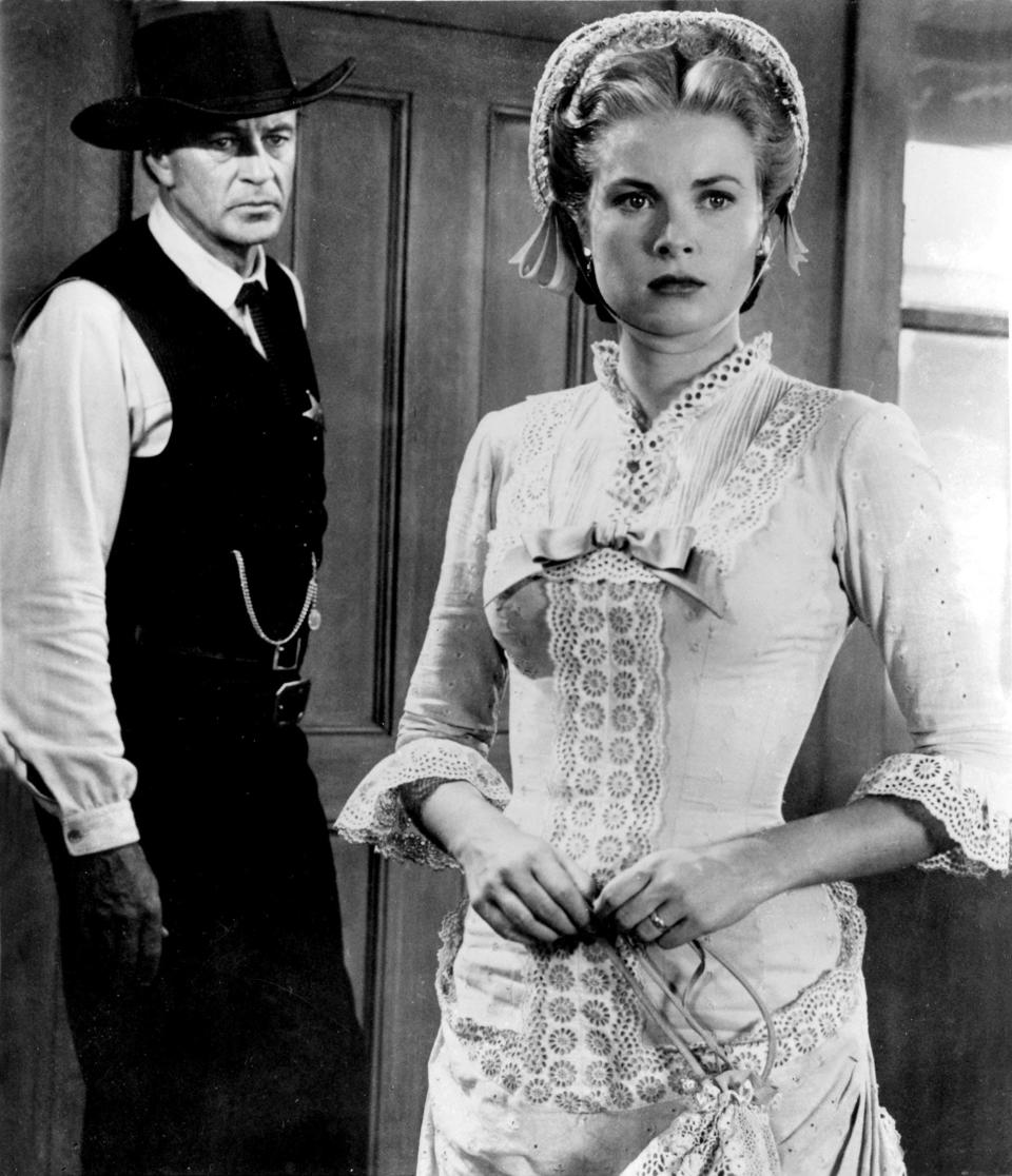 Marshal Will Kane (Gary Cooper) and his wife Amy (Grace Kelly) face deadly desperadoes in "High Noon."