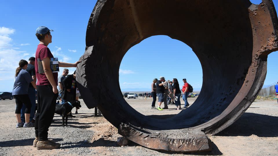 The remnant of the container used to hold the first tested atomic bomb is seen as people visit during an open house on Saturday, October 15, 2022. - Matt McClain/The Washington Post/Getty Images