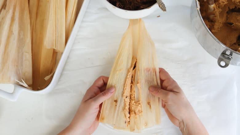 folding tamales