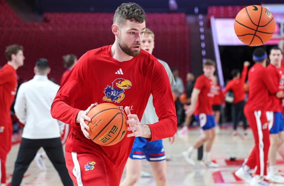 Kansas basketball center Hunter Dickinson warms up before a game against Houston at the Fertitta Center on March 9, 2024 in Houston.