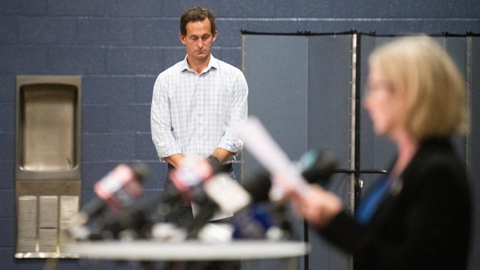 Scott Ellis, center, a relative of two missing children swept away by floodwaters last Saturday, attends a during a press conference held at the Washington Crossing United Methodist Church in Washington Crossing, PA, on Monday, July 17, 2023.