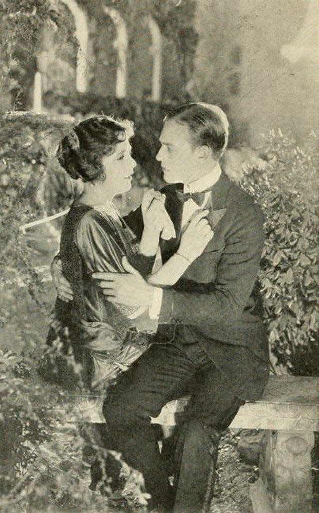 Lois Wilson and Conrad Nagel embrace in the 1921 silent film “The Lost Romance.”