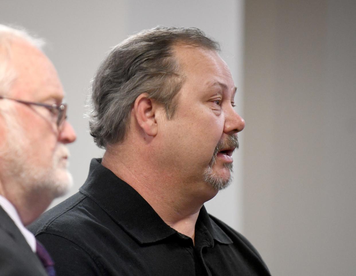 Douglas R. Mackey, right, stands with defense attorney Jeffrey Jakmides as Mackey is sentenced in Carroll County Municipal Court on Wednesday for charges arising from a crash that killed three people. Judge Gary L. Willen gave him a suspended jail sentence and imposed $630 in fines. The head-on crash occurred when he was driving his employer's truck near Dellroy.