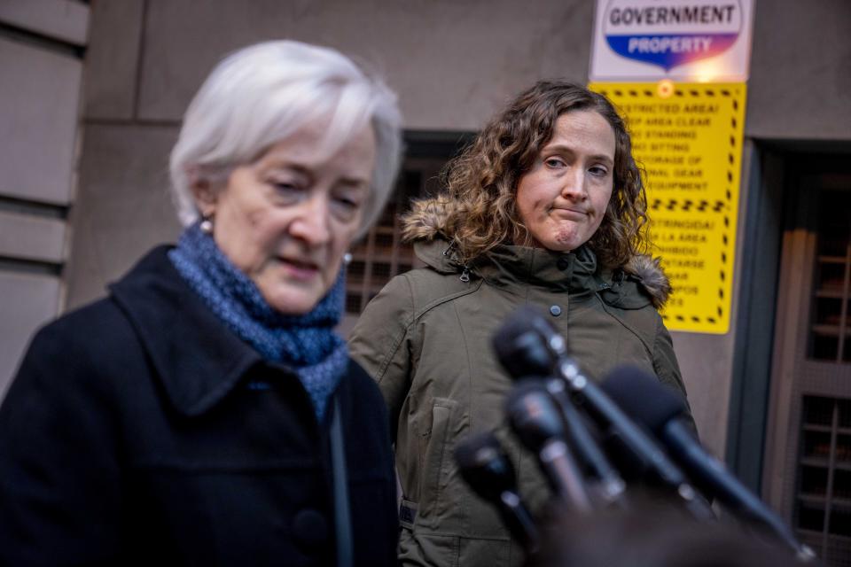 Stephanie Bernstein, who's husband, Michael Stuart Bernstein was killed in the bombing of Pan Am Flight 103 over Lockerbie, Scotland, accompanied by her daughter Sara, right, speaks to member of the media in front of the federal courthouse in Washington, Monday, Dec. 12, 2022. The Justice Department says a Libyan intelligence official, Abu Agila Mohammad Mas'ud Kheir Al-Marimi, accused of making the bomb that brought down Pan Am Flight 103 over Lockerbie, Scotland, in 1988 in an international act of terrorism has been taken into U.S. custody and will face federal charges in Washington. (AP Photo/Andrew Harnik)