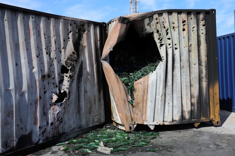 A damaged container is seen at Tripoli port after an attack