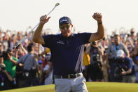 Phil Mickelson celebrates after winning the final round at the PGA Championship golf tournament on the Ocean Course, Sunday, May 23, 2021, in Kiawah Island, S.C. (AP Photo/David J. Phillip)