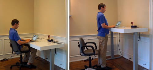 David Pogue sitting and standing at the Stir desk