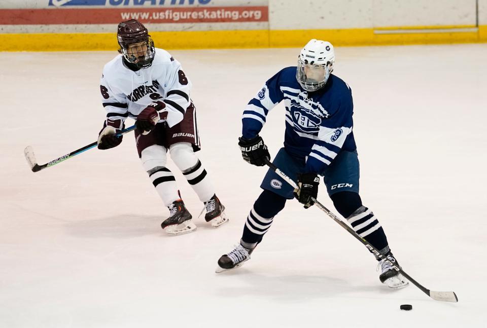 Chatham's Ryan Burke (3) plays against Morristown's Clark Smith (6). Chatham defeats Morristown, 5-2, at the Mennen Sports Arena on Monday, Dec. 12, 2022.