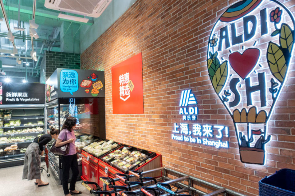 Aldi shoppers looking at produce in a Shanghai store in China.