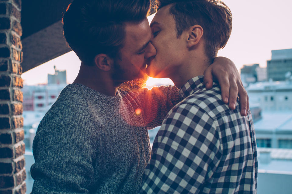 Couple kissing. (Getty Images)